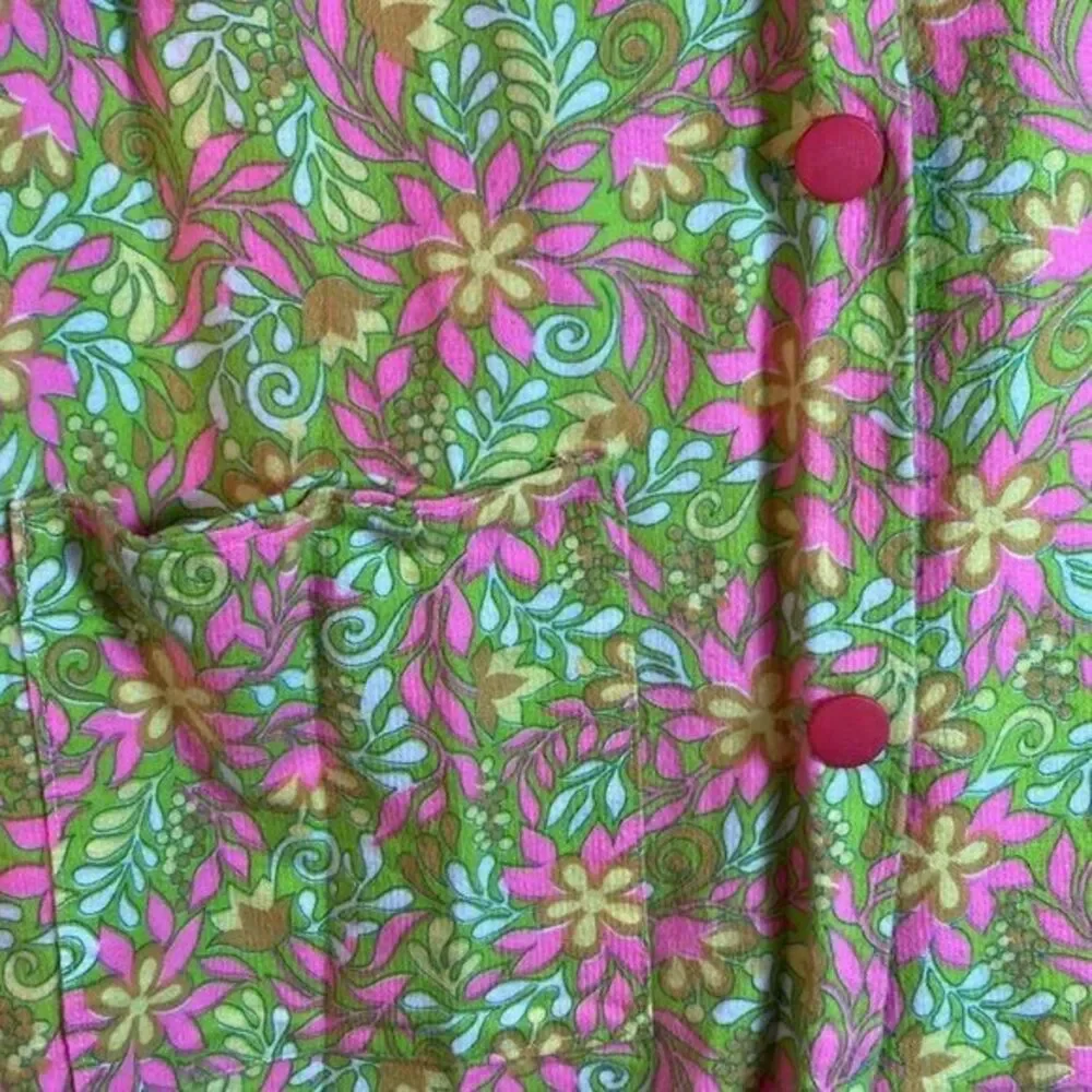 1970’s pink girls robe with short sleeve 30” length. 34” chest  120